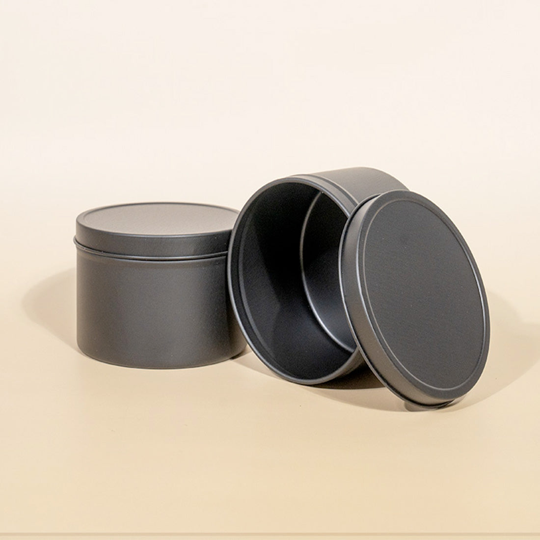 Boîte ronde métallique noir sans soudure 