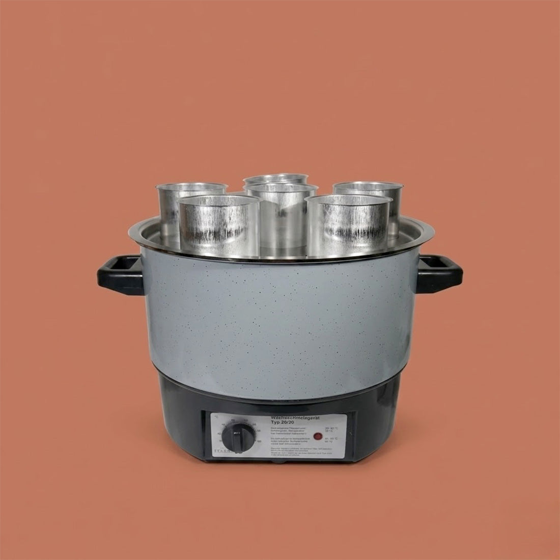 T20 - Appareil pour fondre la cire